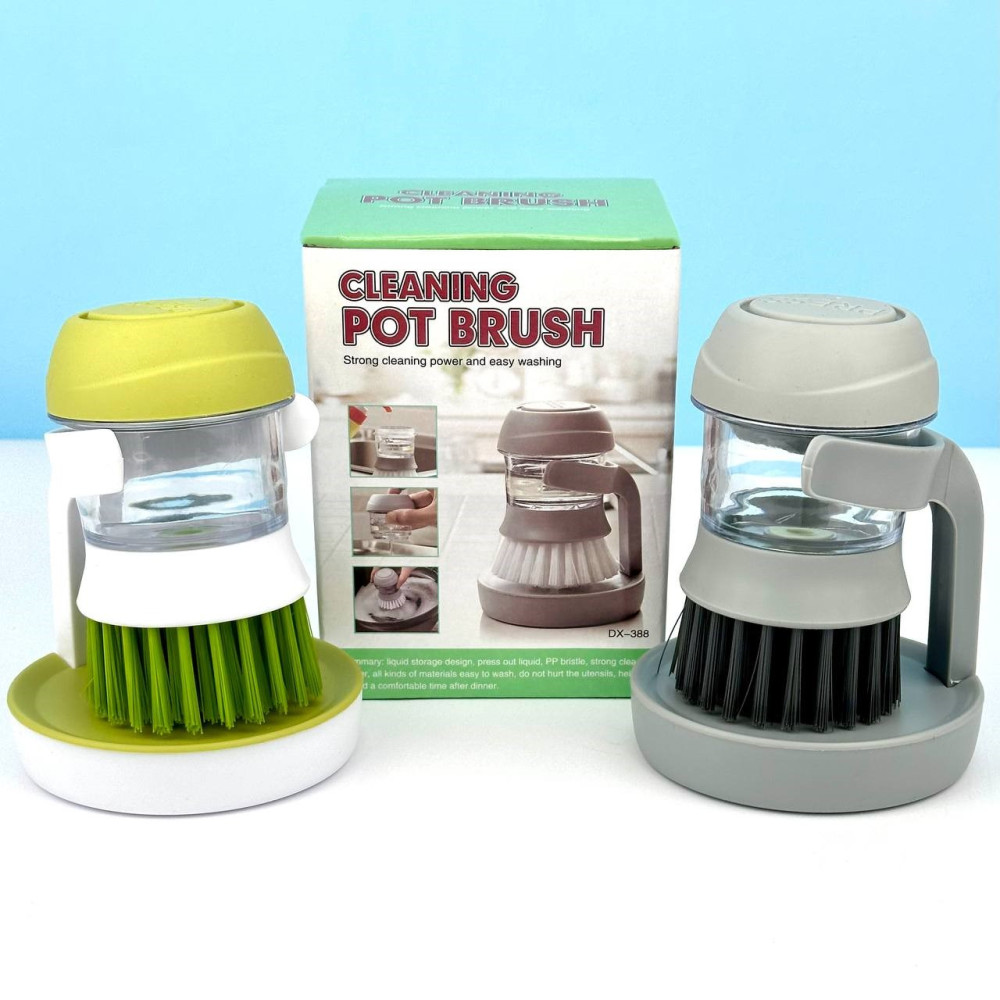 Dishwashing brush with detergent dispenser
