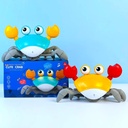 Toy-interactive dancing crab with musical accompaniment, backlight rechargeable QC-1Y (orange)